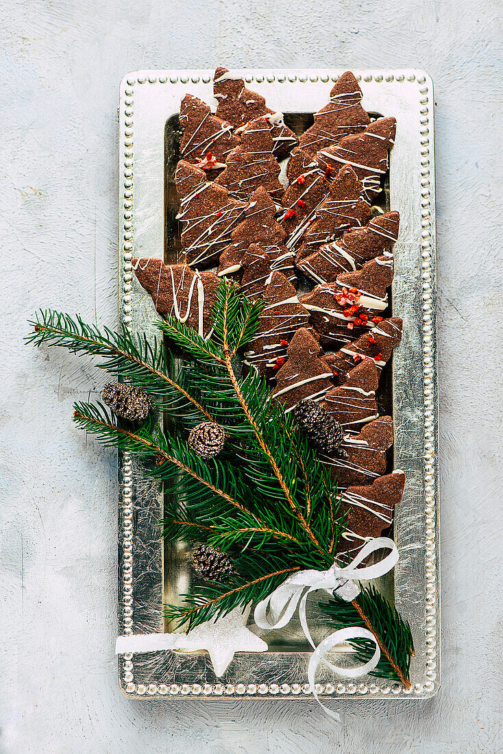 Chocolate hazelnut cookies in the shape of a Christmas tree