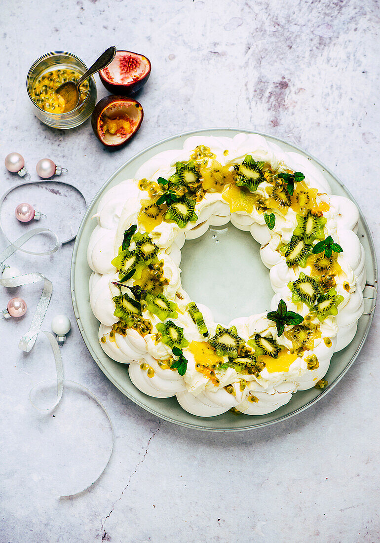 Kiwi and passion fruit pavlova