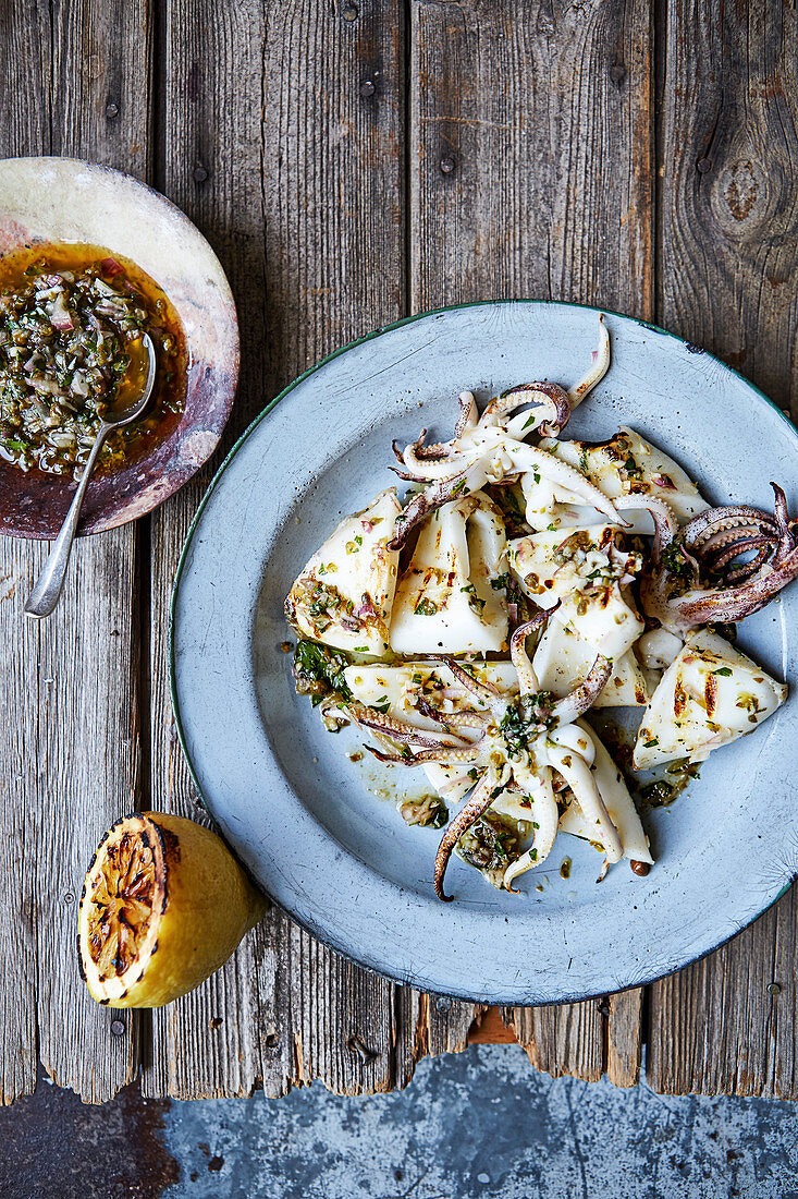 Barbecued squid with charred lemon and caper dressing
