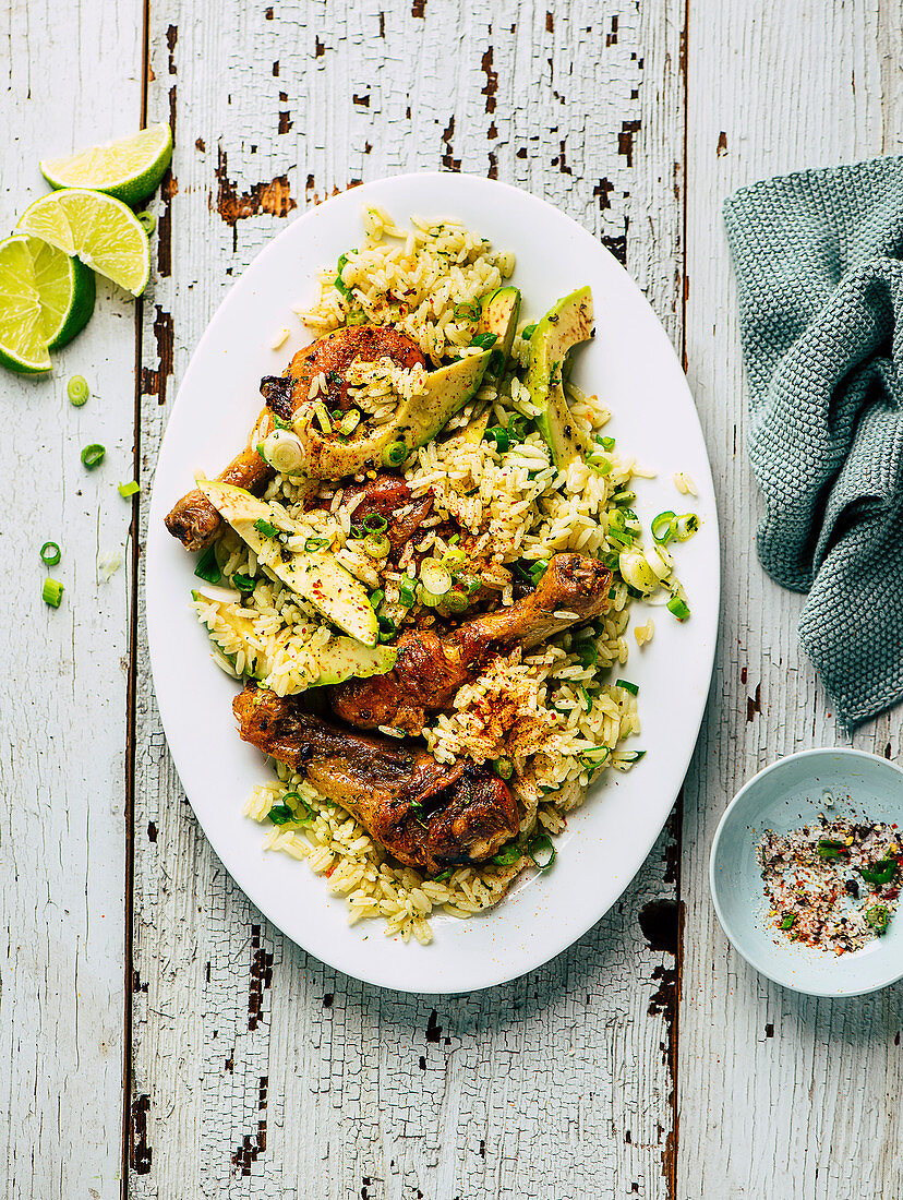 Roast chicken drumsticks with rice and avocado