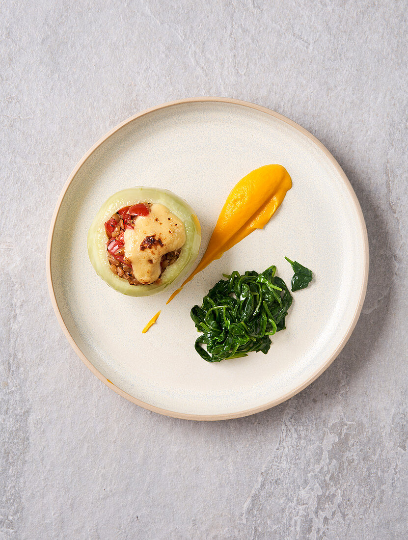 stuffed kohlrabi with spinach leaves and carrot puree (vegan)