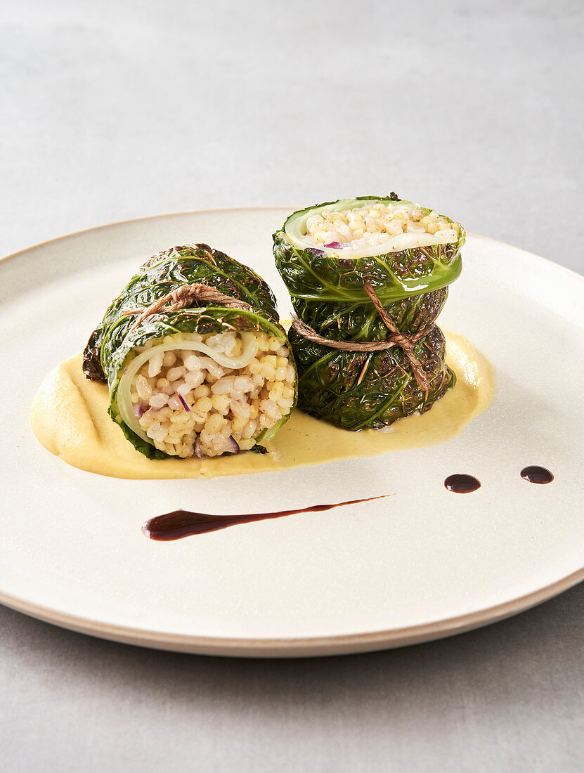 Savoy cabbage roulade on turnip puree with red wine jus (vegan)