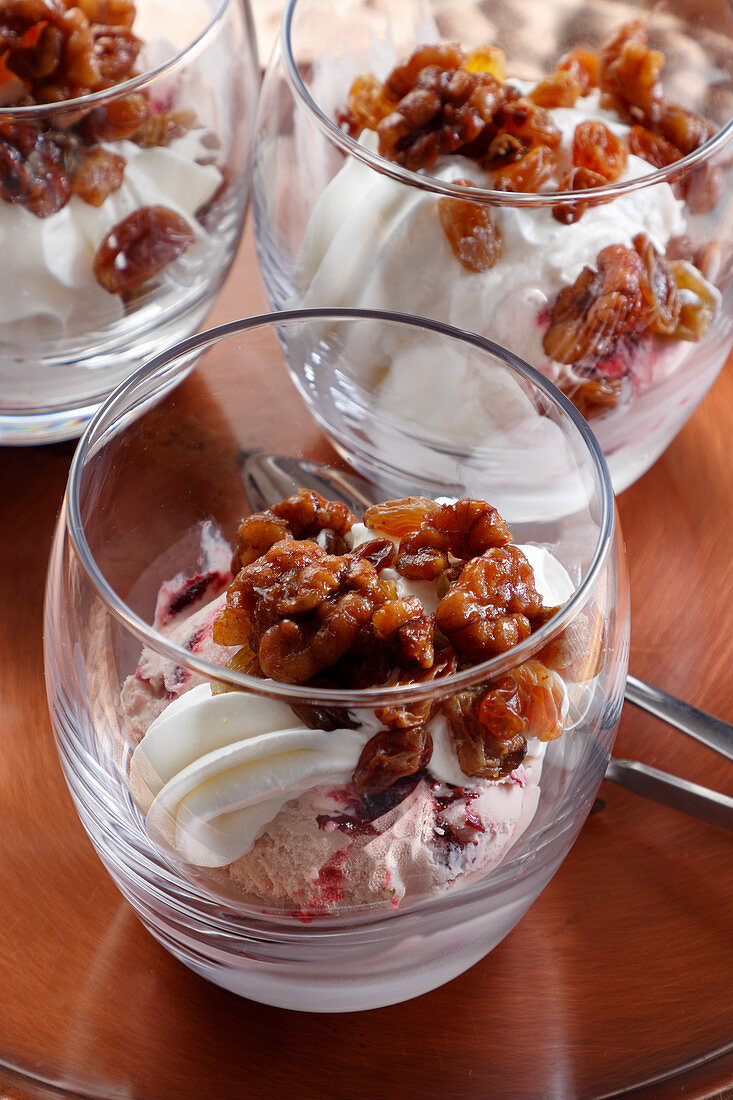 Ice cream with raisins soaked in rum, nuts and whipped cream