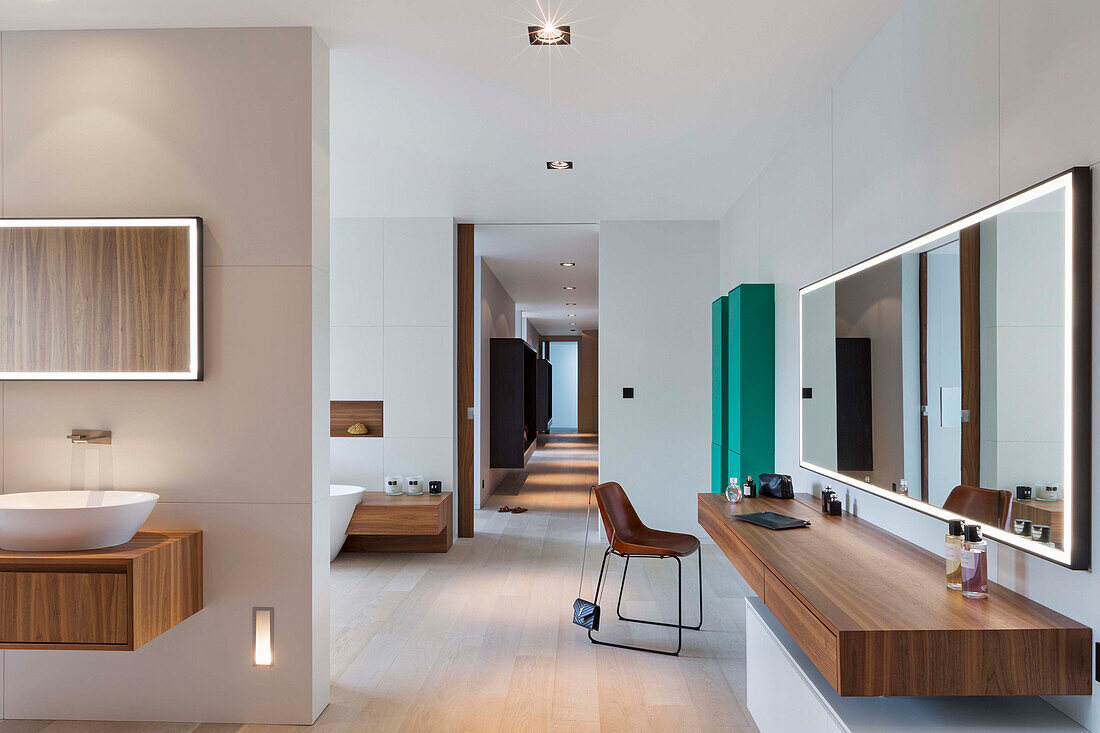 Bespoke bathroom with wooden shelf and wall mirror