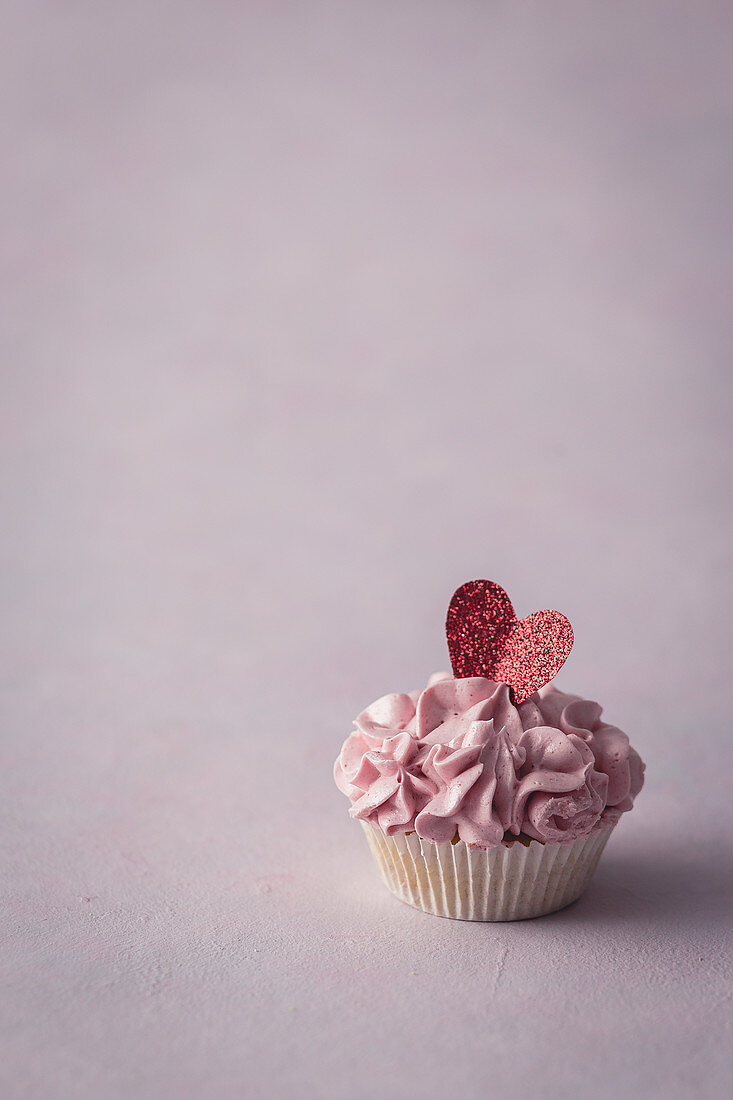 Valentine's Day cupcake with pink frosting