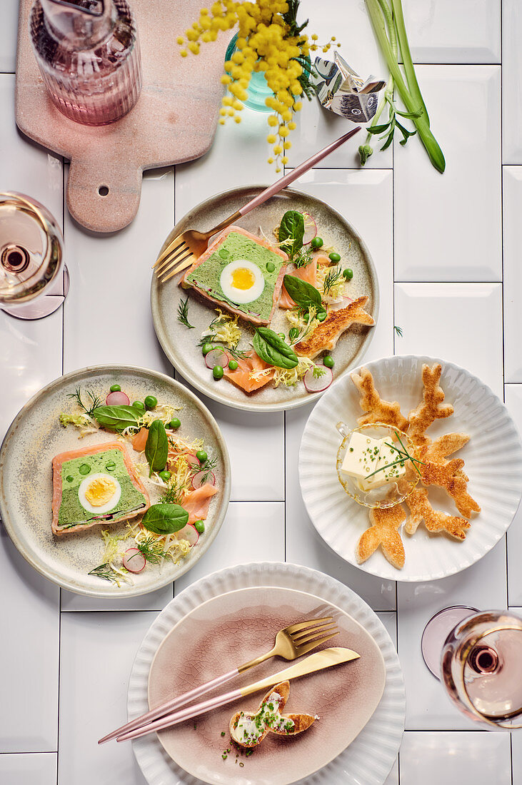 Salmon terrine with spinach, peas, and egg with Easter bunny toast