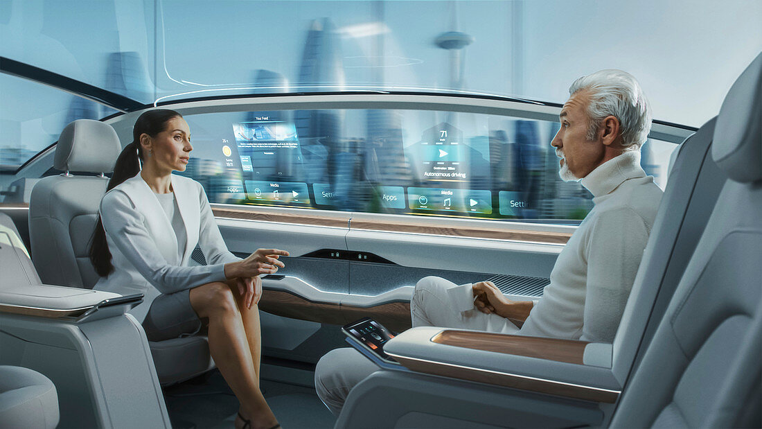 Man and woman talking in a driverless car