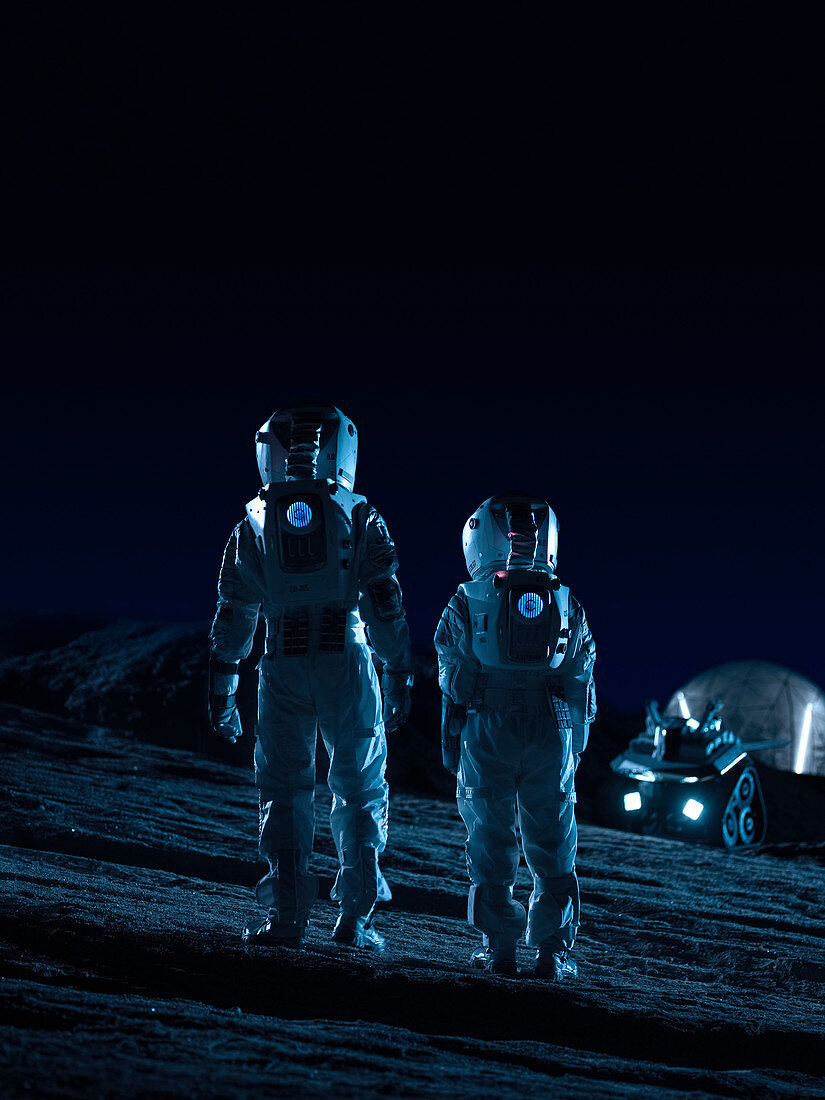 Two astronauts looking at the stars from an alien planet