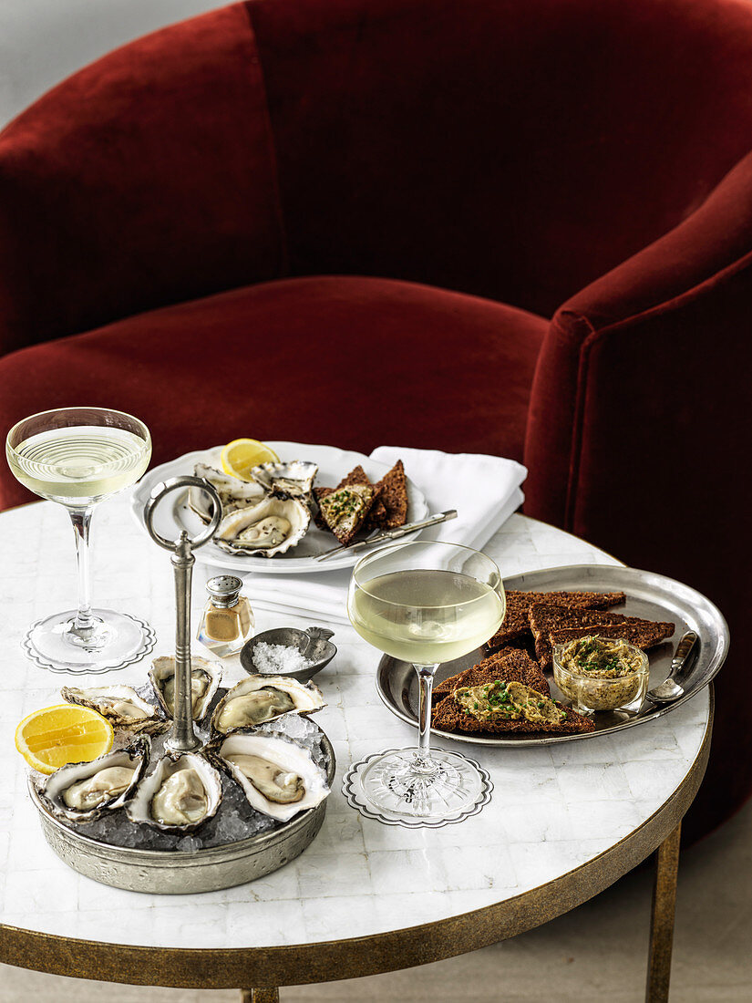 Rock oysters with seaweed butter on rye bread, Champagne Gimlet