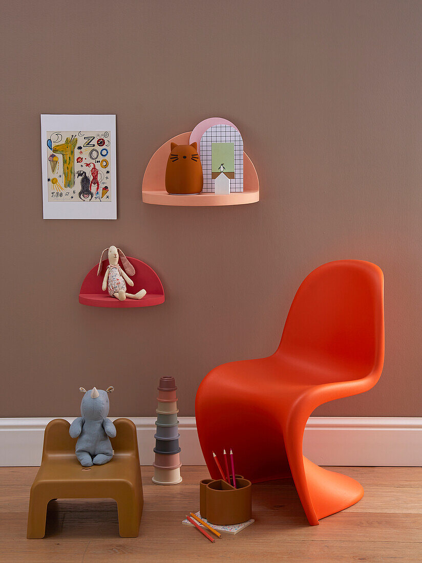 Semi-circle shelves, classic children's chair and toys