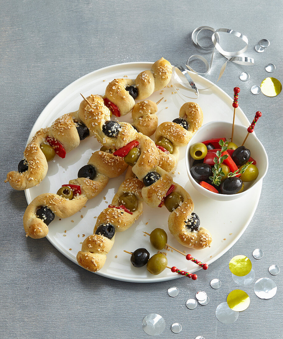 Olive twists made from garlic dough