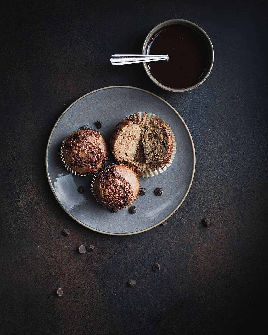 Muffins on a plate served with syrup