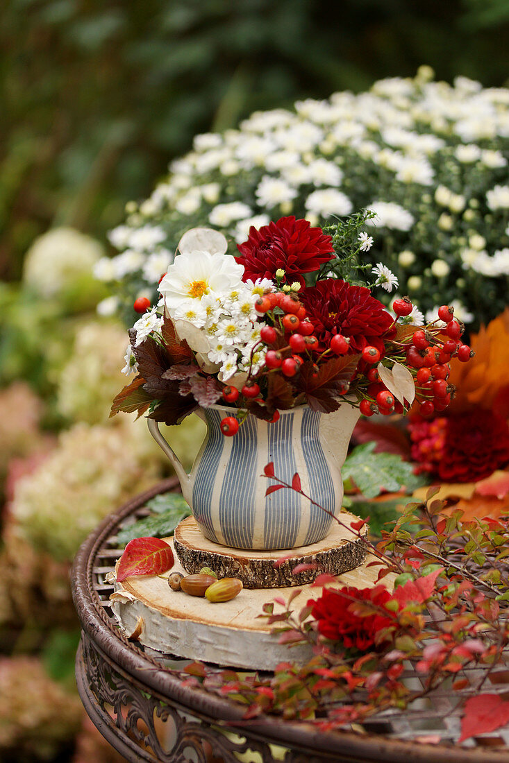 Autumn bouquet of dahlias and red berries