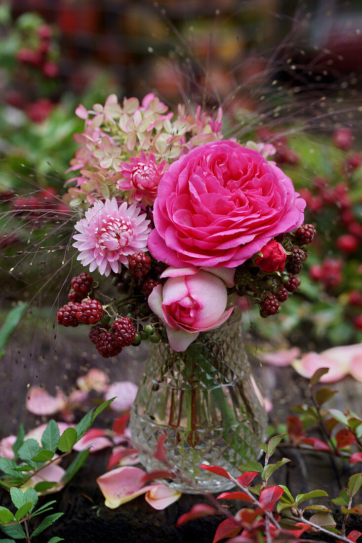 Bouquet of roses, blackberries, hydrangea and everlasting flowers