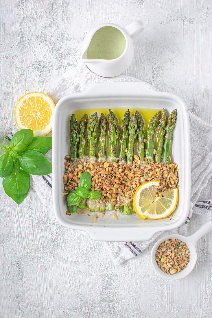 Baked asparagus with Parmesan cheese and nuts