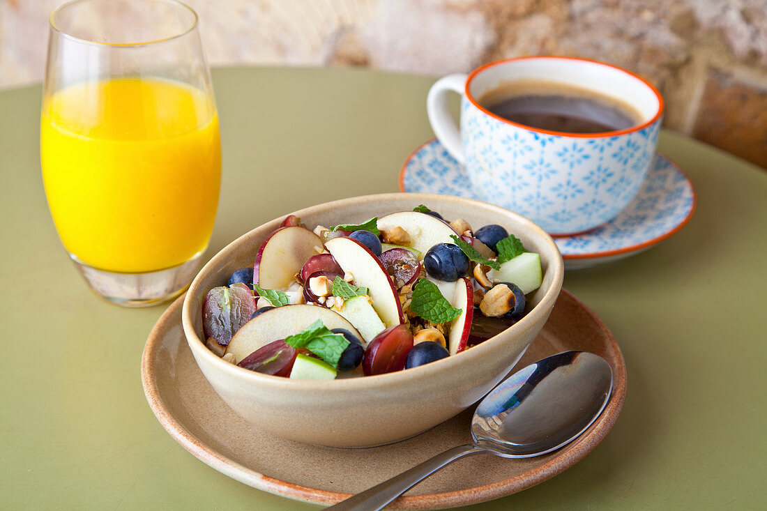 Fruit muesli with grapes, apple and blueberries