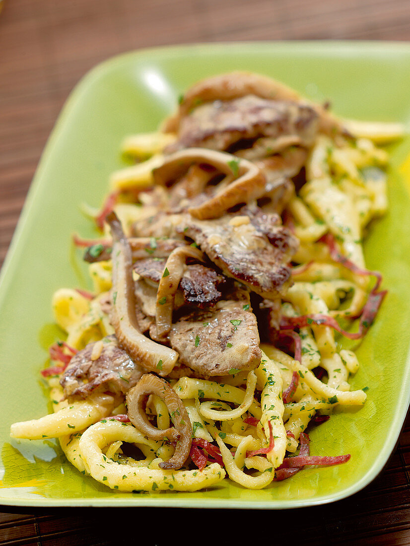 Thinly sliced steak with king oyster mushrooms and spaetzle