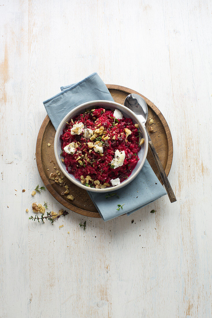 Beetroot risotto with goat cheese, thyme, and honey