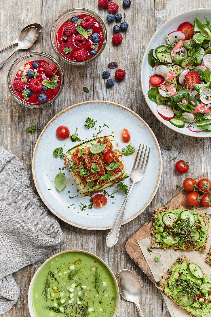 an assortment of raw food dishes from a vegan kitchen