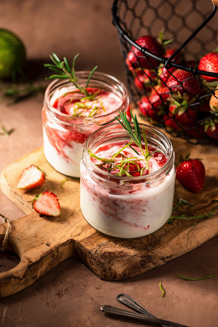 Strawberry dessert with greek yoghurt, lime zest and rosemary