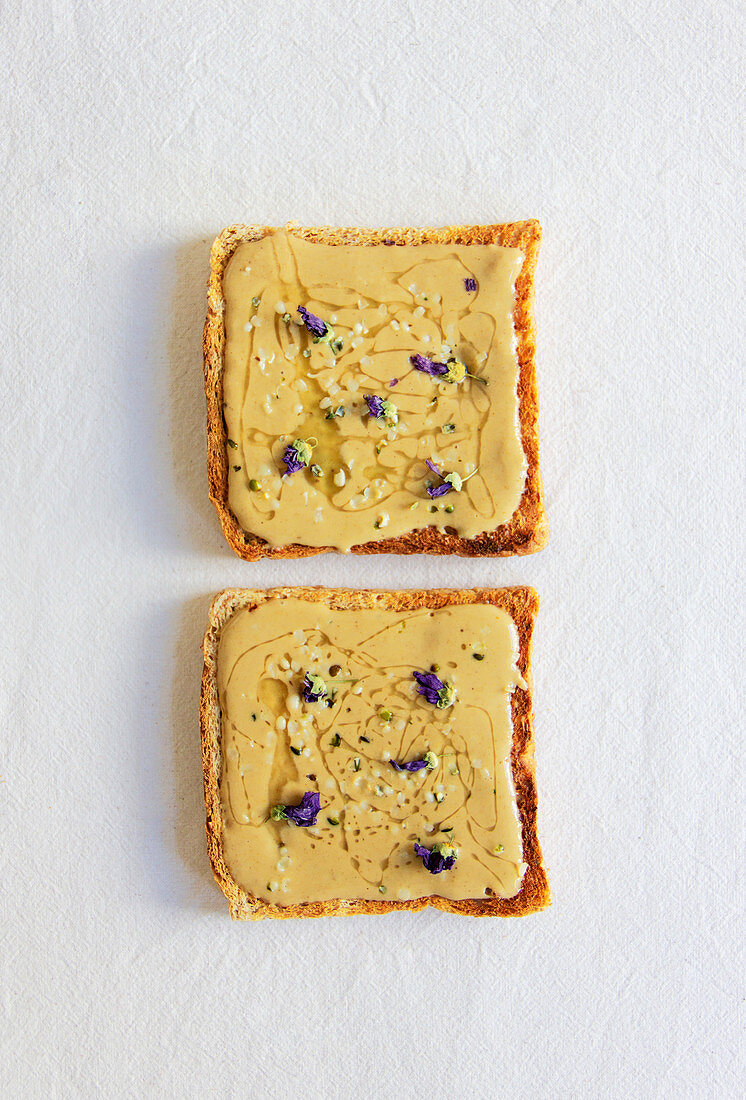 Toast with tahini, honey and mallow blossoms