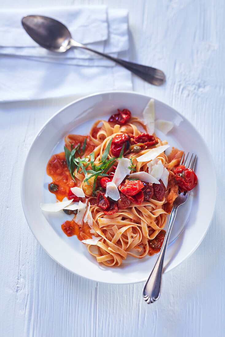 Fettuccine with sun-dried tomatoes, capers, and anchovies
