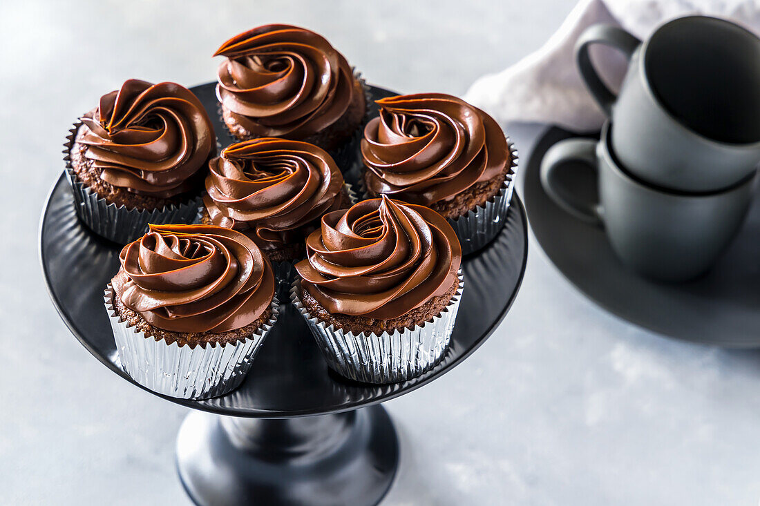 Chocolate cupcakes with ganache frosting