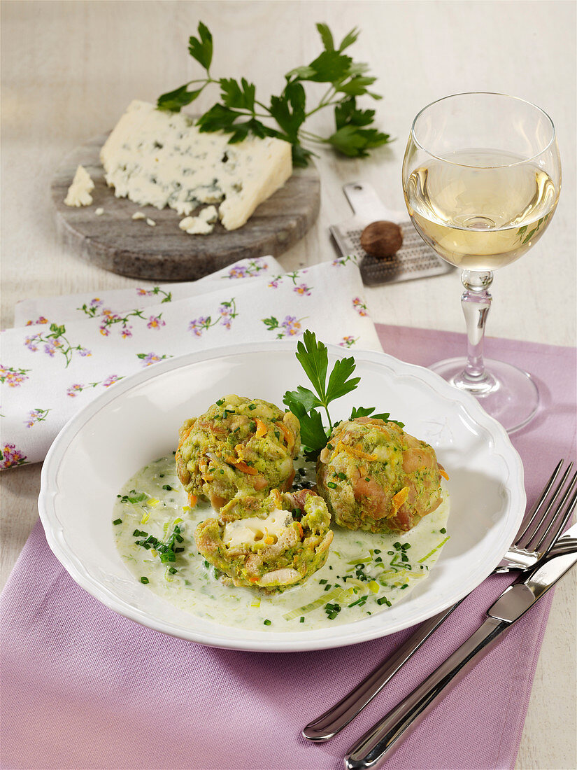 Gluten-free carrot bread dumplings with herb sauce