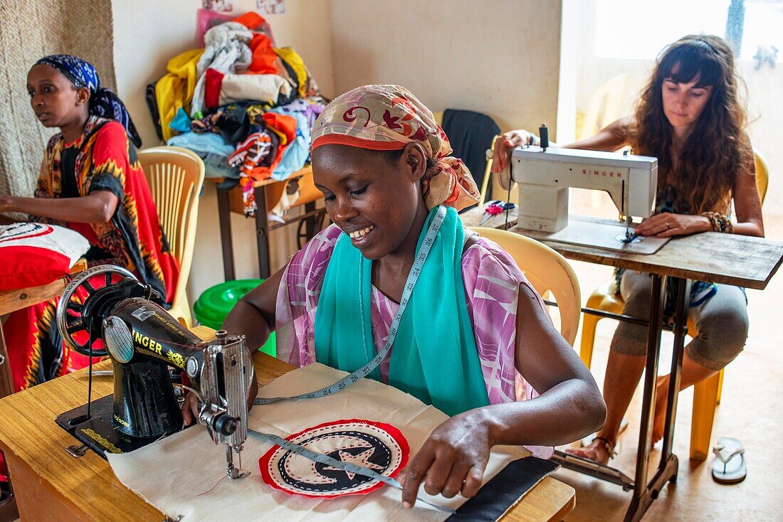 Women sewing cloths, Lamu, Kenya