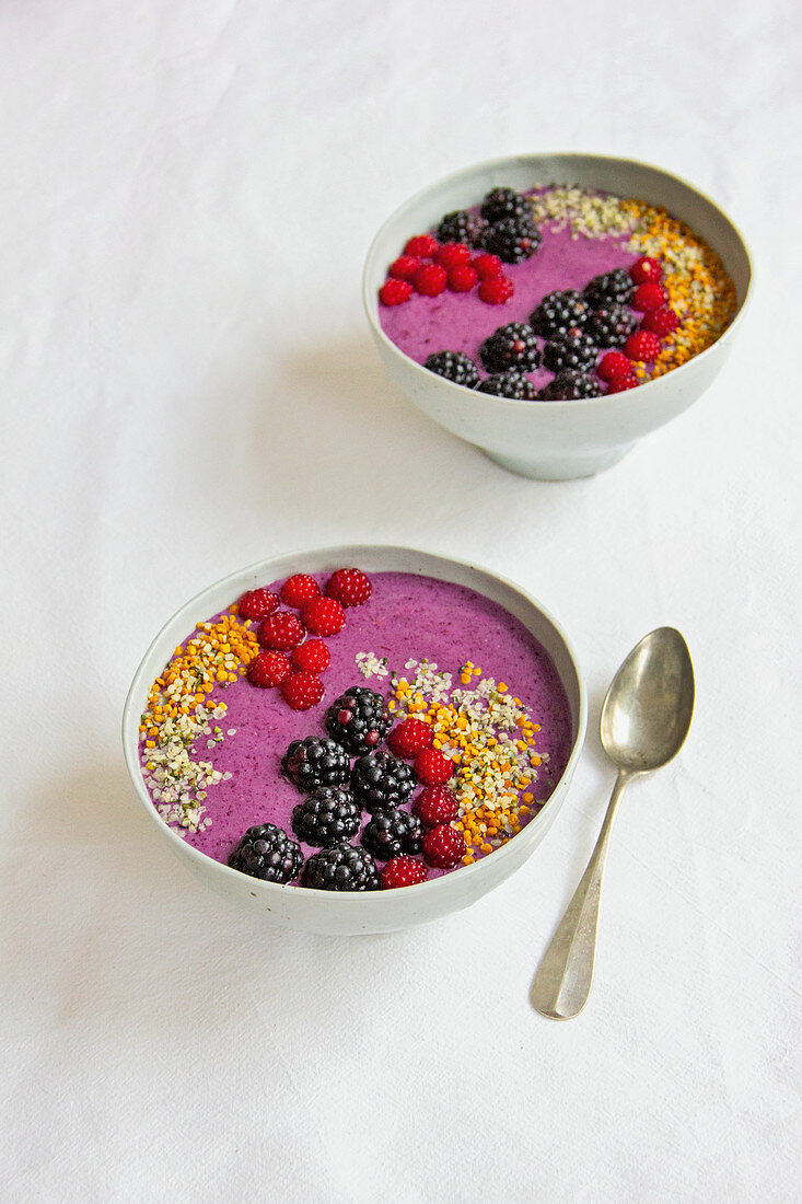 Vegan wild berry bowl with flaxseed and soy milk