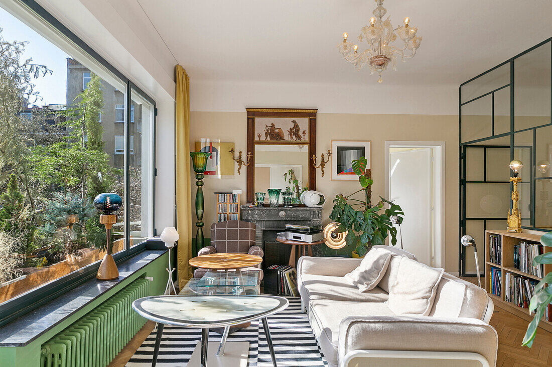 Light-flooded seating area with pale sofa