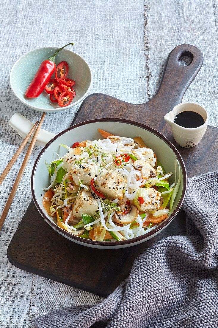 Rice noodles with fried tofu and sesame
