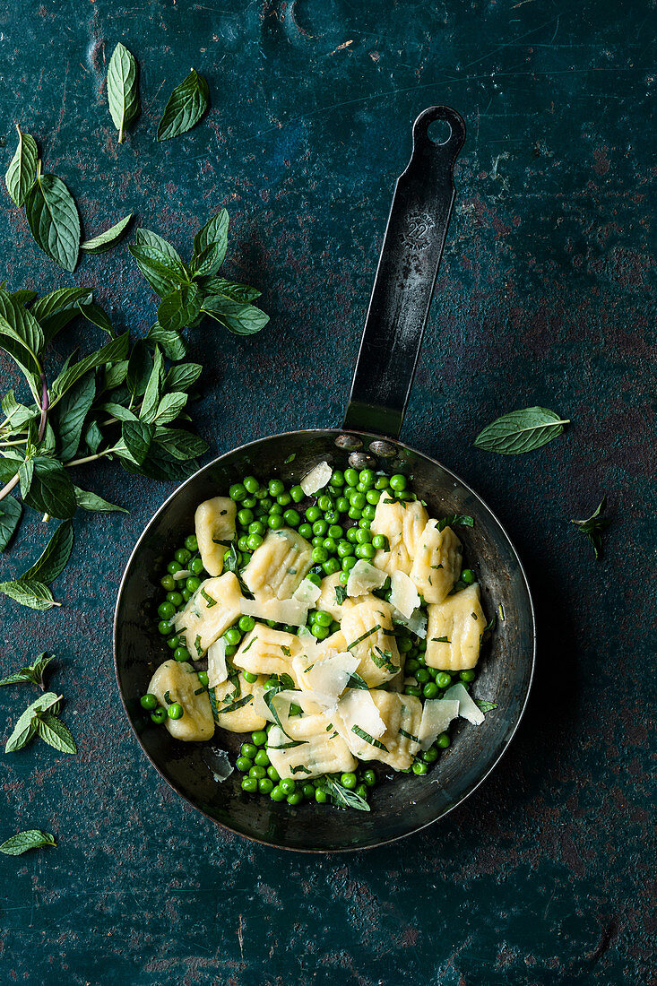 Gnocchi with freshly podded peas and Parmesan cheese