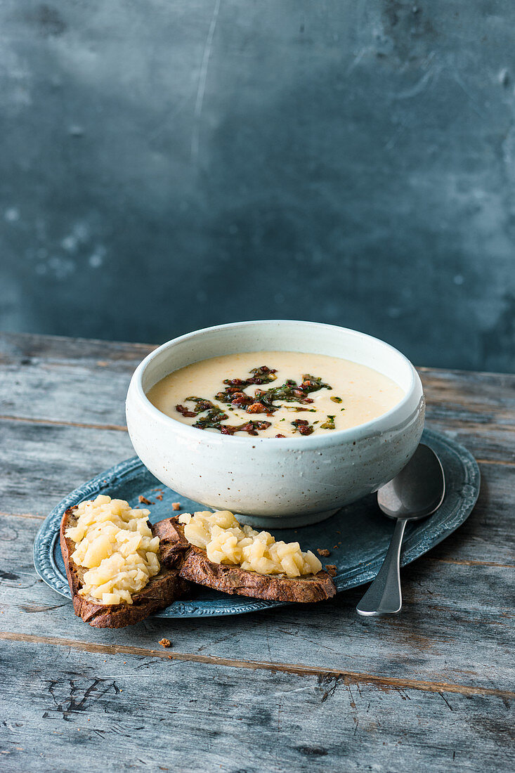 Potato soup with bacon and grilled bread