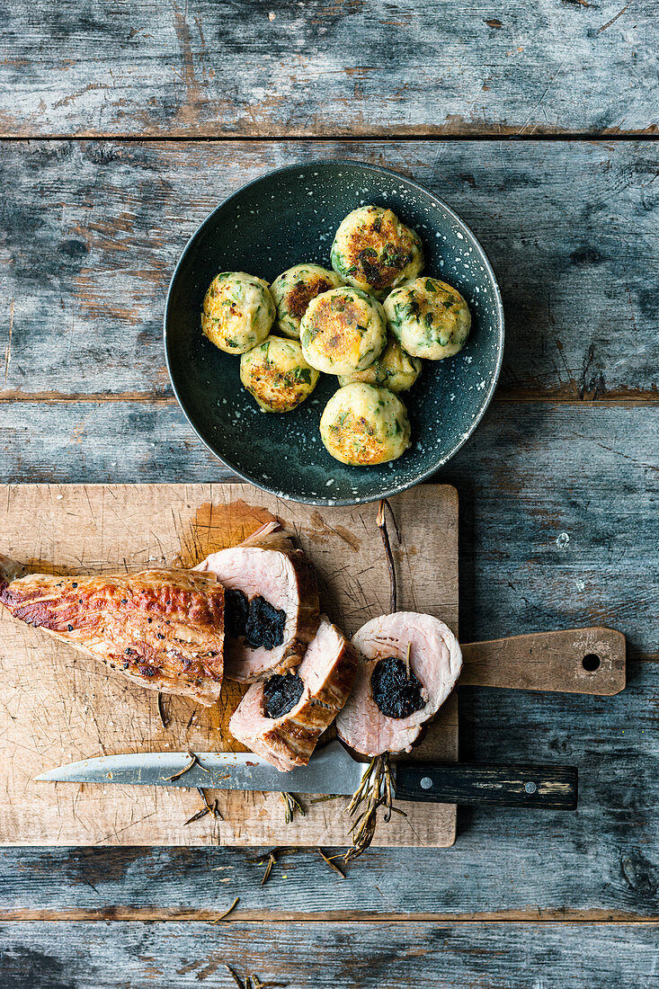 Stuffed pork fillet with dried plums and potato dumplings