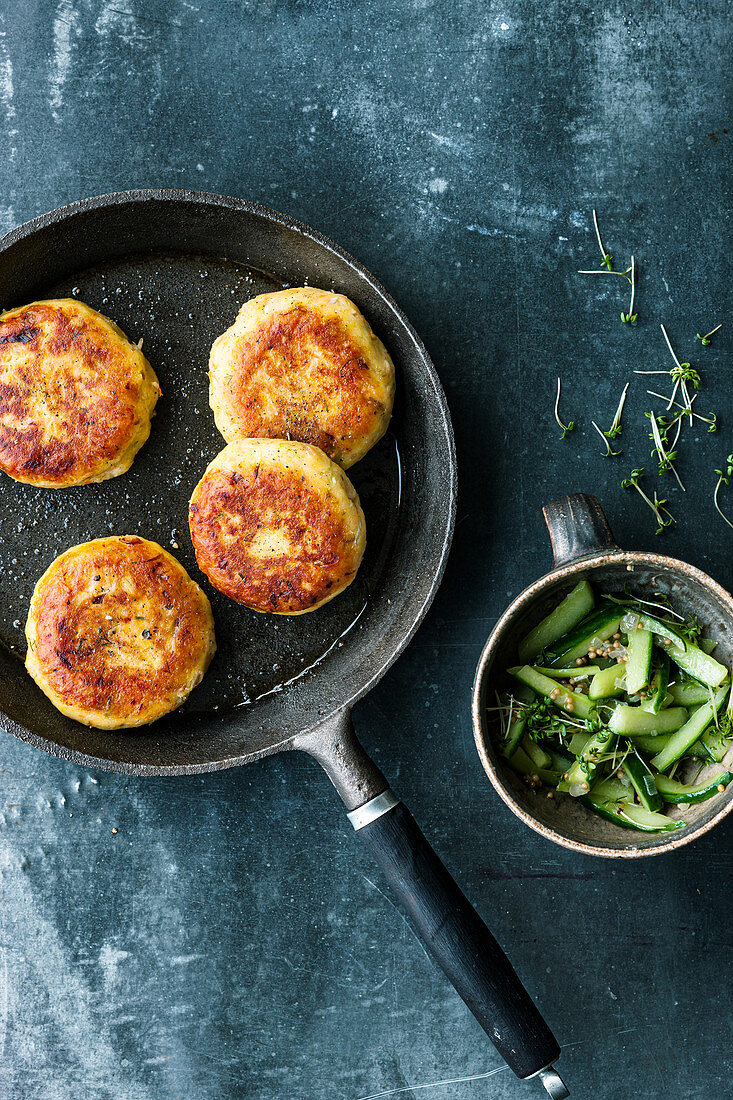 Trout and potato cakes with braised cucumber