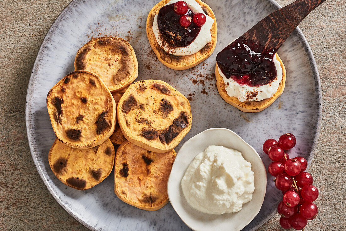 Sweet potato toast with ricotta and berry jam