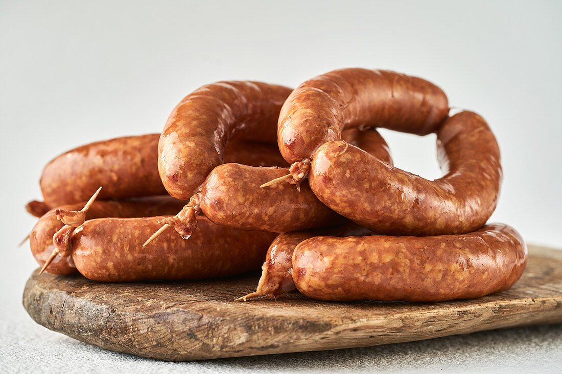 Sausages on a wooden board