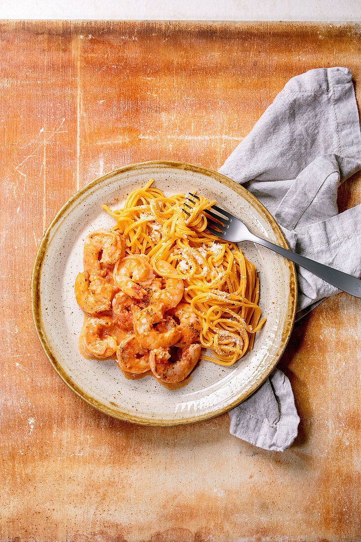 Tomato spaghetti with prawns and parmesan cheese