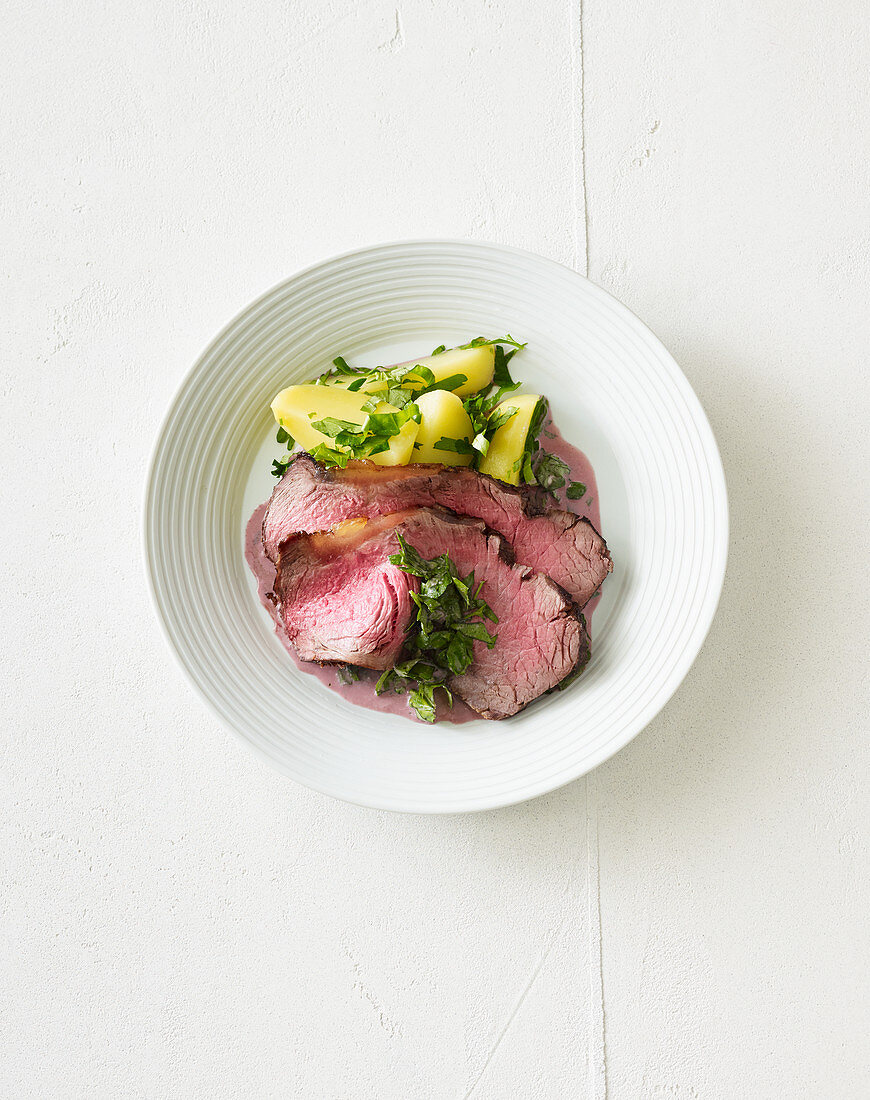 Roast beef with herb potatoes