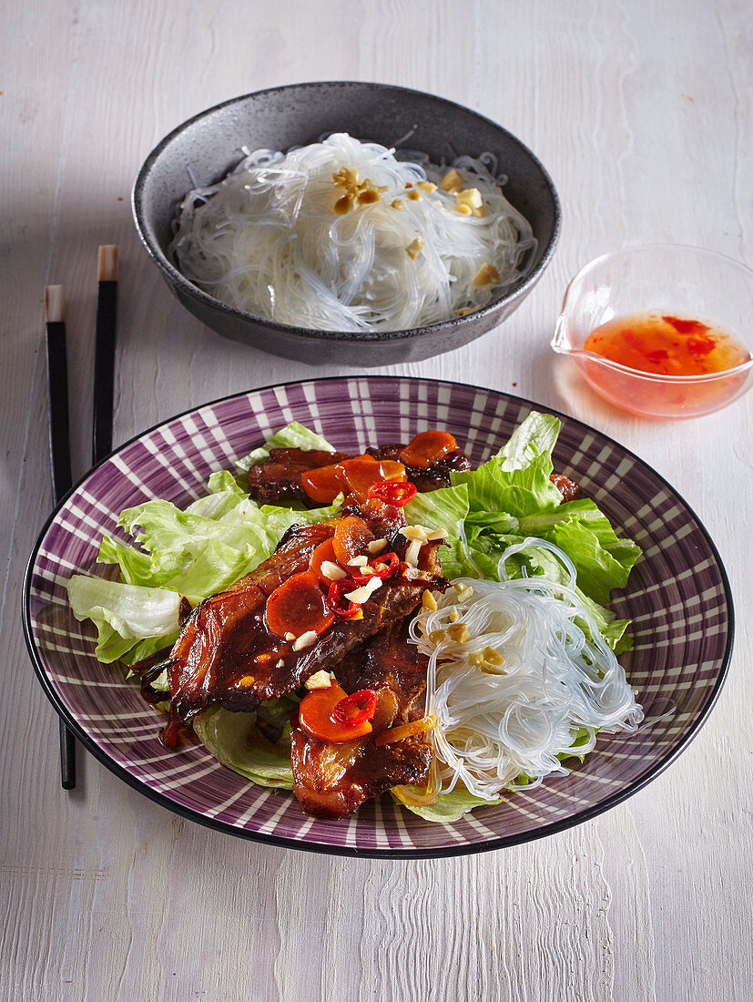 Vietnamese pork with sweet sour sauce and noodles