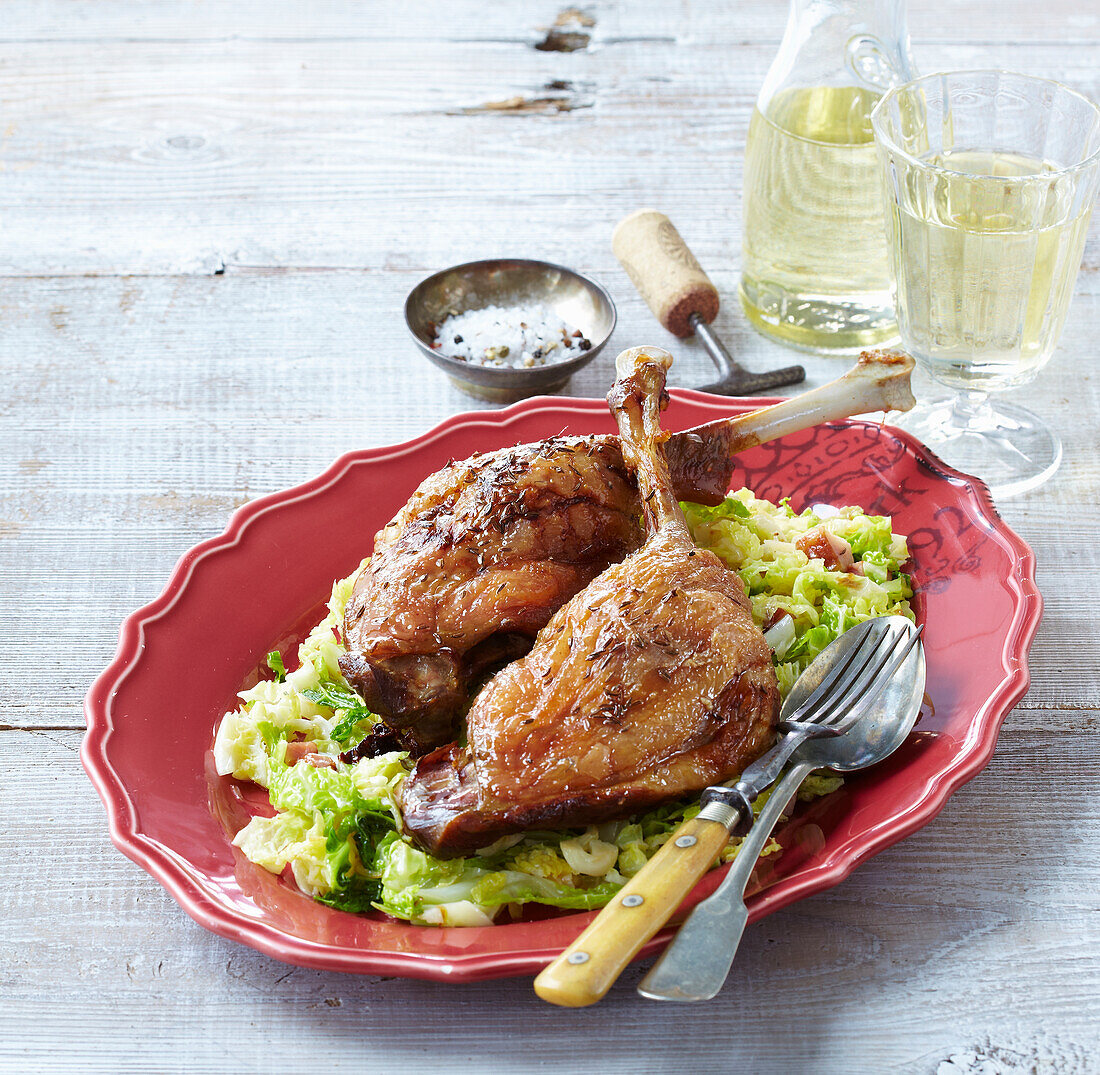 Baked goose legs with cabbage