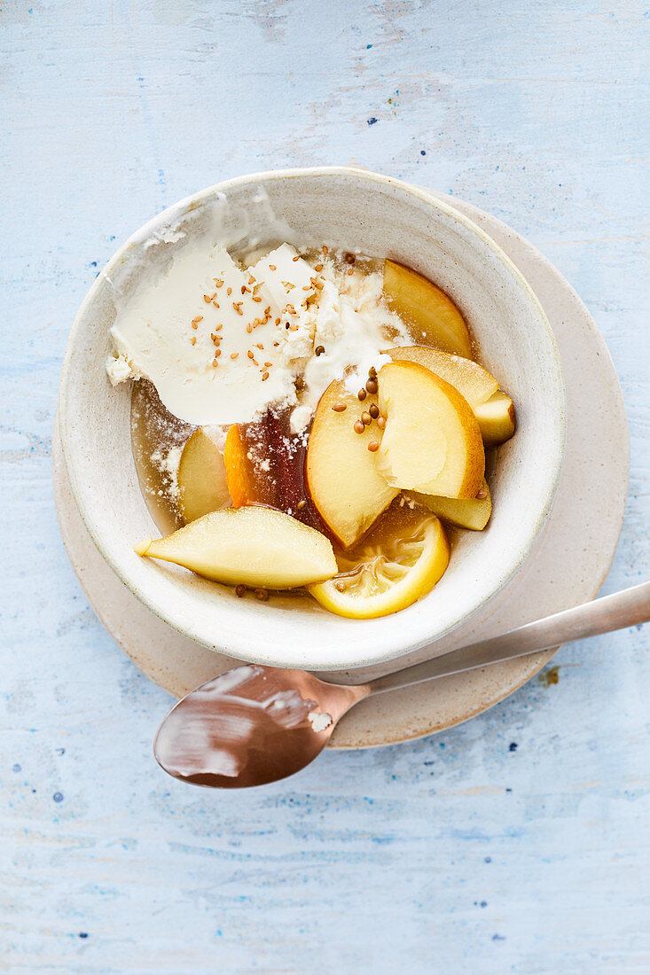 Warm apple and pear compote with labneh ice cream