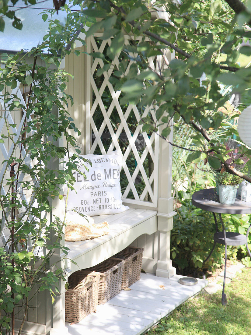 Cosy seat in arbour