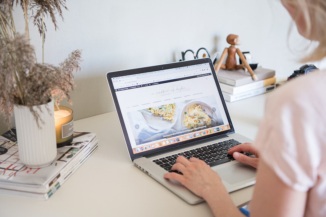 Woman with a laptop at work