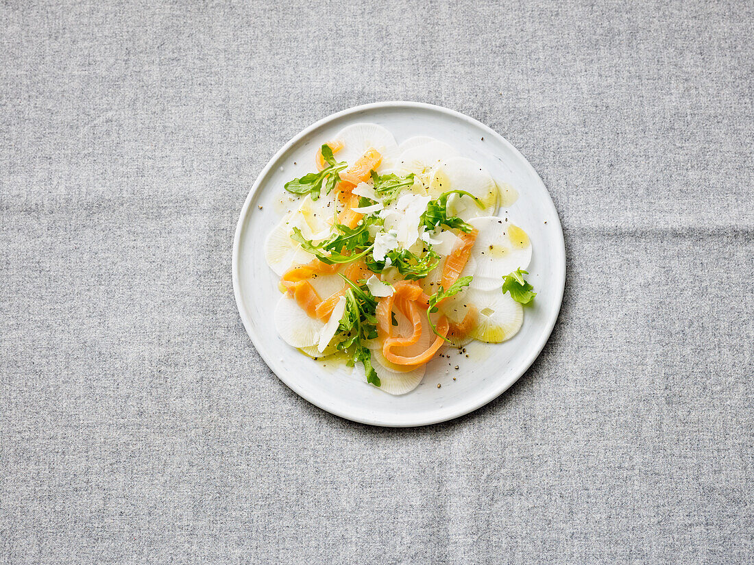 Radish carpaccio with smoked salmon and Parmesan cheese