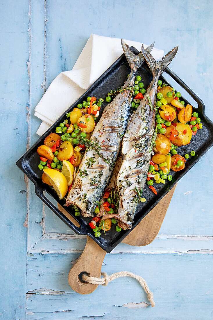 Grilled whole mackerel with vegetables and roasted potatoes