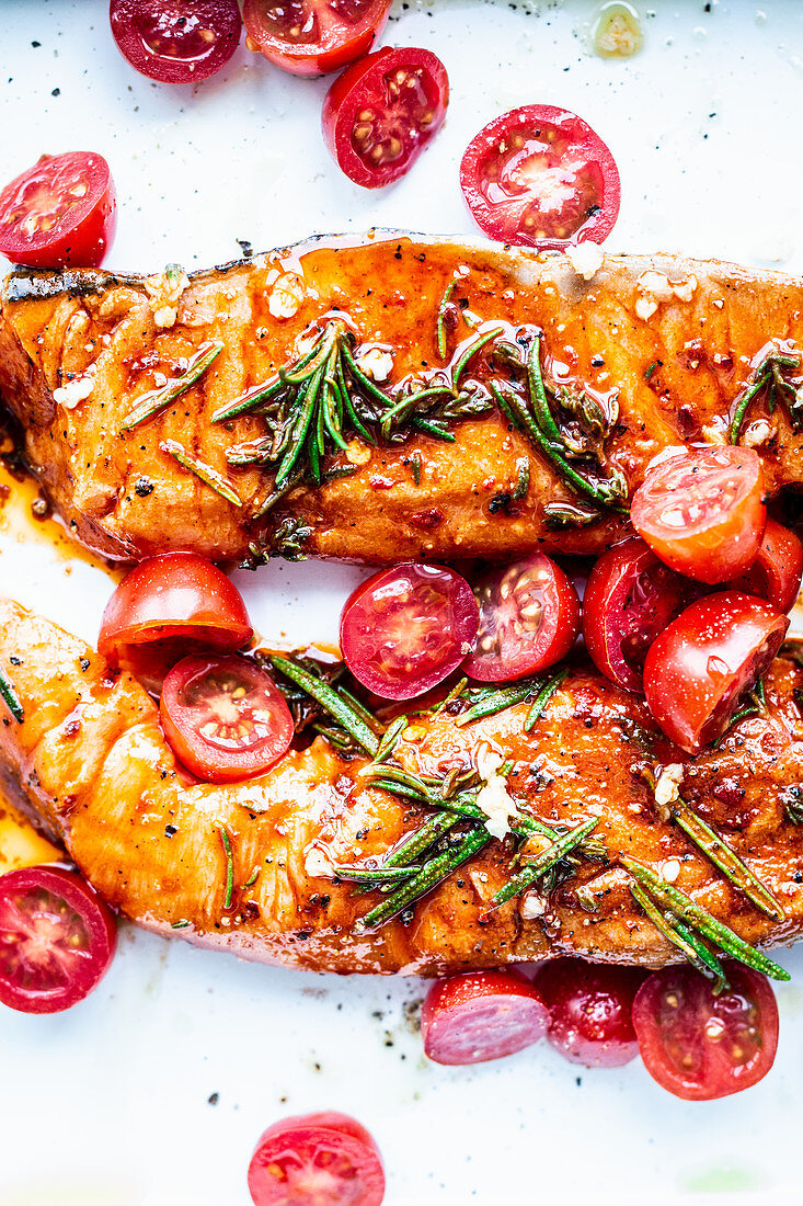 Salmon from the oven with cherry tomatoes and rosemary