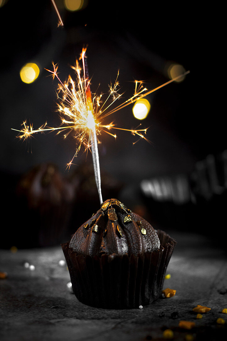 Chocolate muffin with sparkler