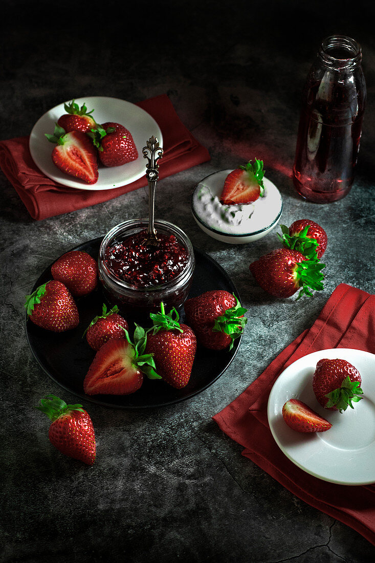 Strawberry jam and fresh strawberries